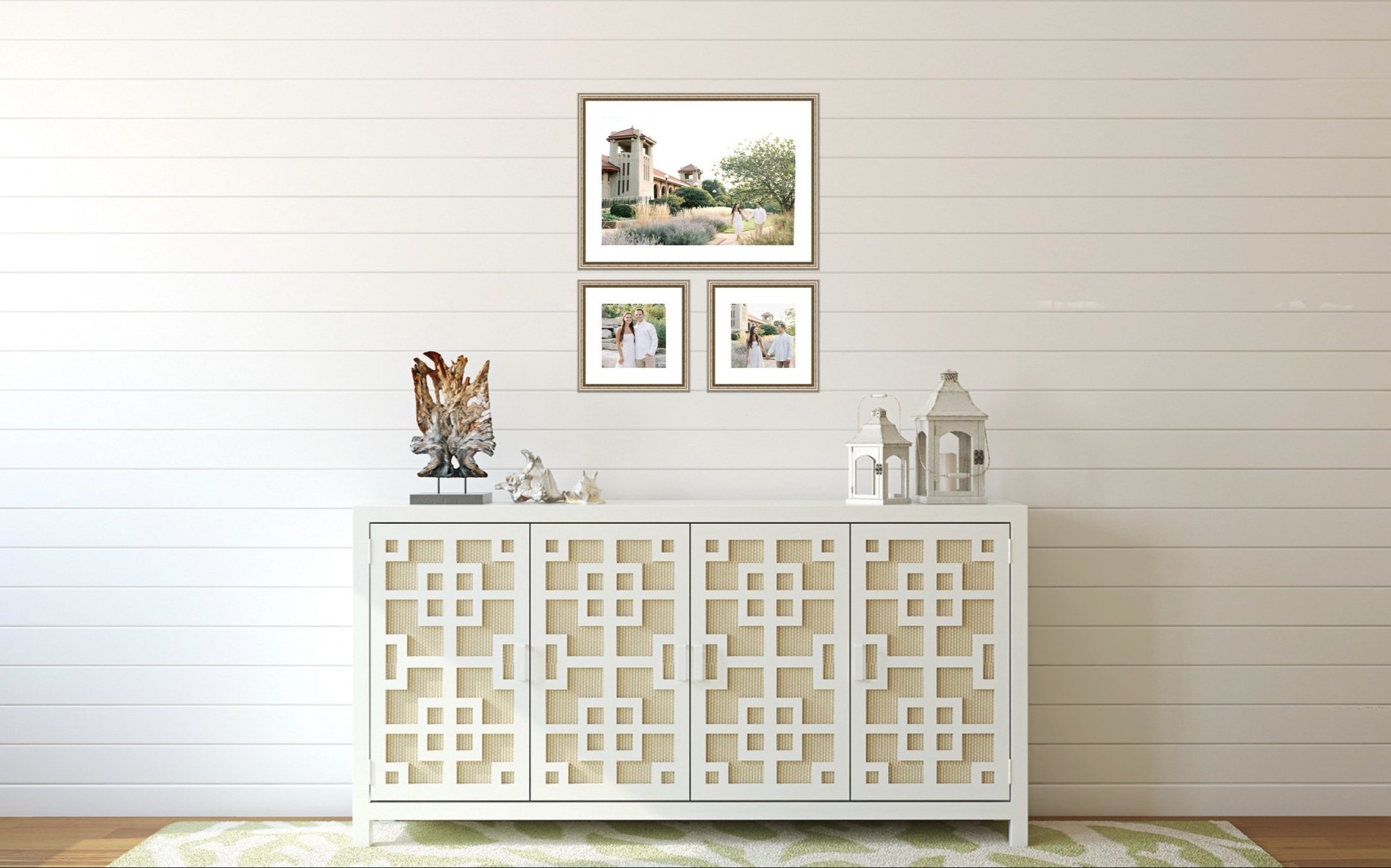 A foyer with custom framing including three frames with engagement photos in a client's home